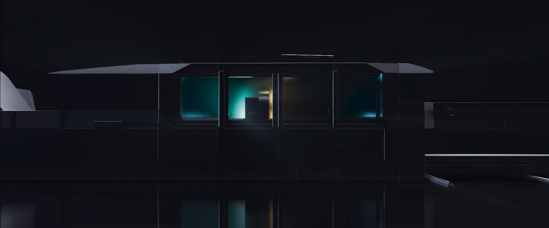 La macchina industriale LXN REVOLUTION di Dallan è parzialmente visibile in un ambiente buio, con le sue luci interne e le finestre che emettono un bagliore bluastro e arancione. La macchina ha una forma allungata e complessa, con sezioni che suggeriscono una linea di produzione. Dettagli sul lato sinistro sembrano essere componenti meccanici o un braccio robotico, mentre la sezione centrale è illuminata come un'area di lavoro o di osservazione. La superficie scura sottostante riflette le luci della macchina, creando un effetto futuristico e misterioso. L'immagine suggerisce che la macchina è potente e tecnologicamente avanzata.