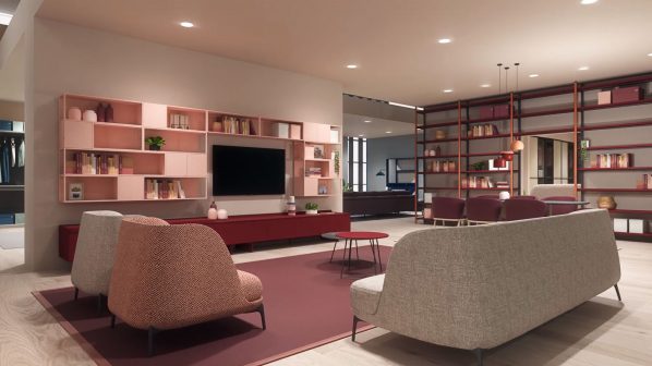 Un ampio e luminoso soggiorno moderno o showroom, arredato con mobili dal design contemporaneo che richiamano lo stile di Novamobili. Al centro della parete di fondo, un grande mobile TV orizzontale in tonalità rosa pastello e bordeaux, con vani aperti e chiusi, è sormontato da una libreria a giorno dello stesso colore. Lo schermo della TV è nero e spento. In primo piano, due poltrone dal design arrotondato, una in tessuto grigio chiaro e una in tessuto rosso/arancione, sono posizionate su un grande tappeto bordeaux. Un tavolino basso rotondo con top rosso completa la zona. Sullo sfondo, si intravede una grande libreria a giorno con struttura e ripiani rossi. L'ambiente è illuminato da faretti incassati nel soffitto, creando un'atmosfera elegante e accogliente.